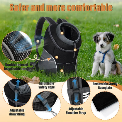 Black pet backpack carrier with adjustable safety features, breathable mesh, beside a small dog on grass