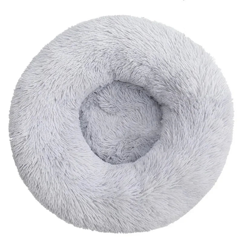 Round fluffy light gray pet bed for dogs or cats, soft plush donut design