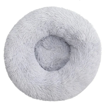 Round fluffy light gray pet bed for dogs or cats, soft plush donut design