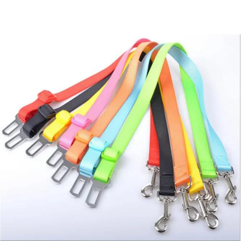 Colorful adjustable pet seat belt straps with metal clips for dog car safety.