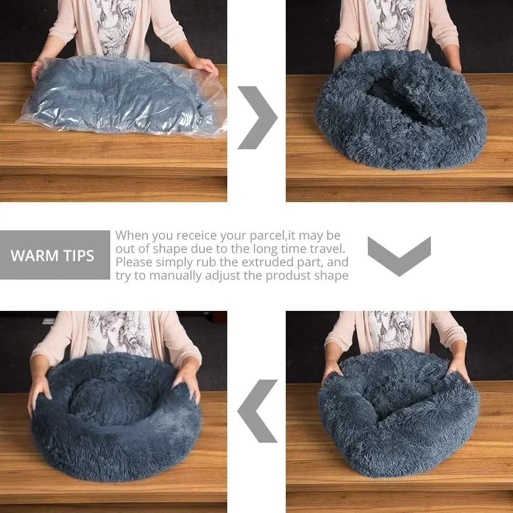 Unpacking and fluffing a round, fluffy gray pet bed on a wooden table, showing reshaping steps.
