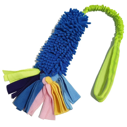 Bright blue and yellow plush dog tug toy with colorful fleece tassels and a handle