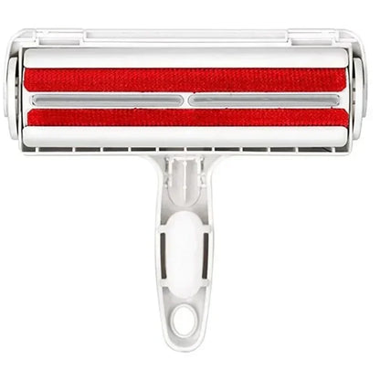 White pet hair remover roller with red fabric lint remover strips and ergonomic handle