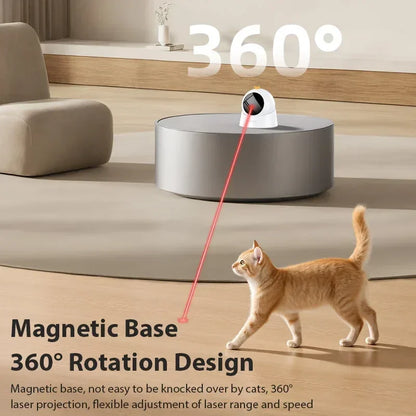 Cat playing with 360-degree rotating magnetic base laser toy in modern living room.