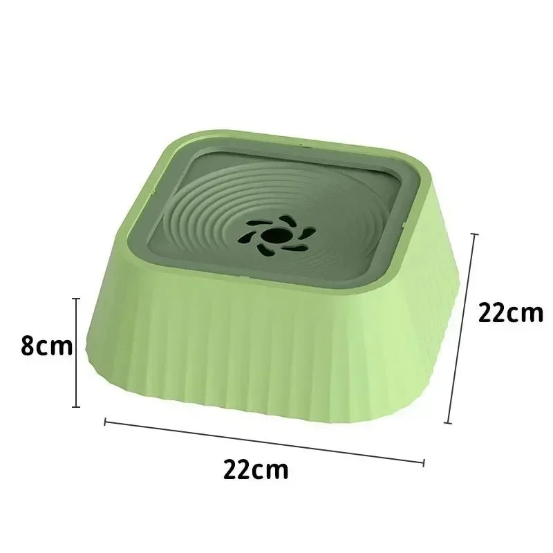 Green slow feeder square pet bowl with spiral pattern, 22cm wide and 8cm high.