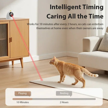Orange cat playing with automatic interactive laser toy in modern living room