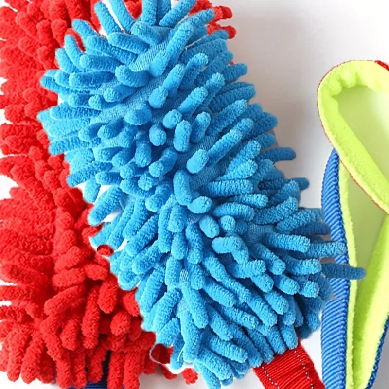 Close-up of colorful plush dog tug toys in blue and red with textured chenille surface