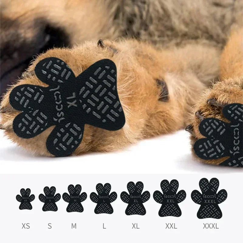 Dog paw wearing black non-slip grip pads for pets, with multiple size options displayed below.