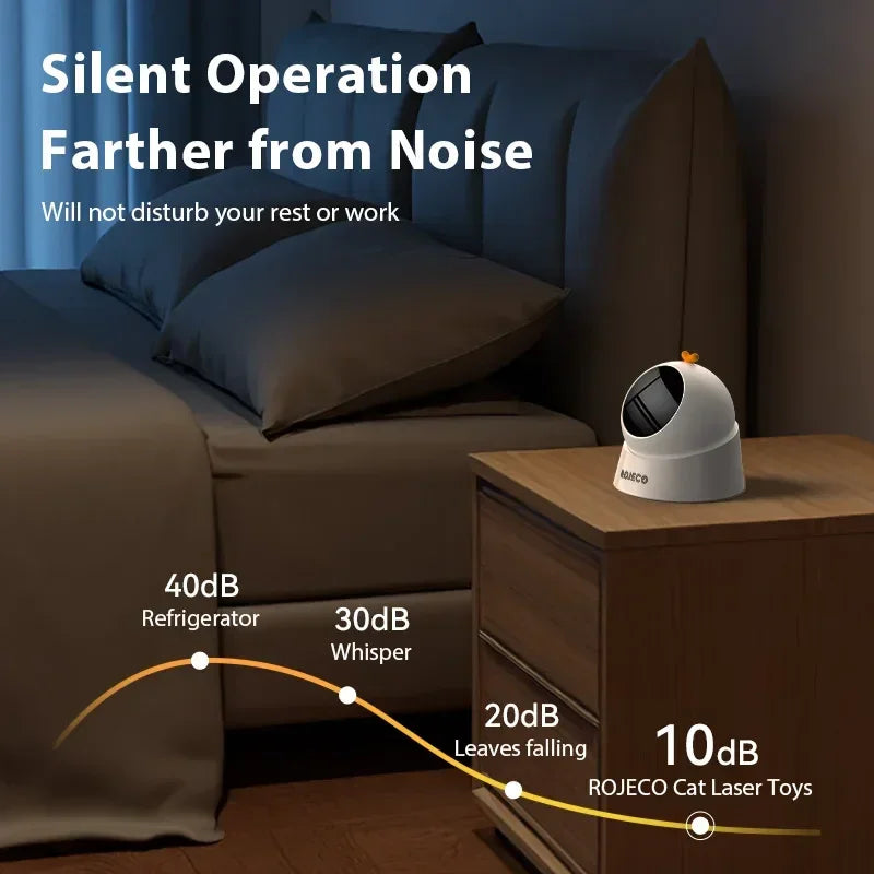 Automatic cat laser toy on bedside table in dark bedroom, highlighting quiet 10dB operation.