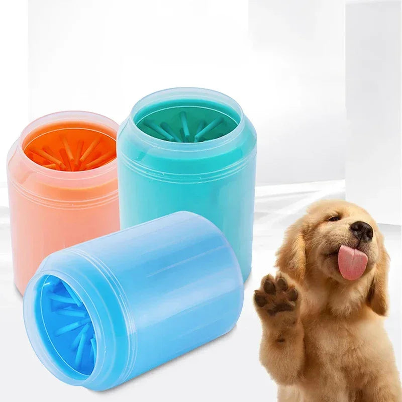 Three colorful dog paw cleaners and a happy puppy on a white background