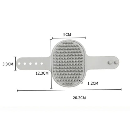 Gray silicone pet grooming brush with adjustable strap and measurement labels