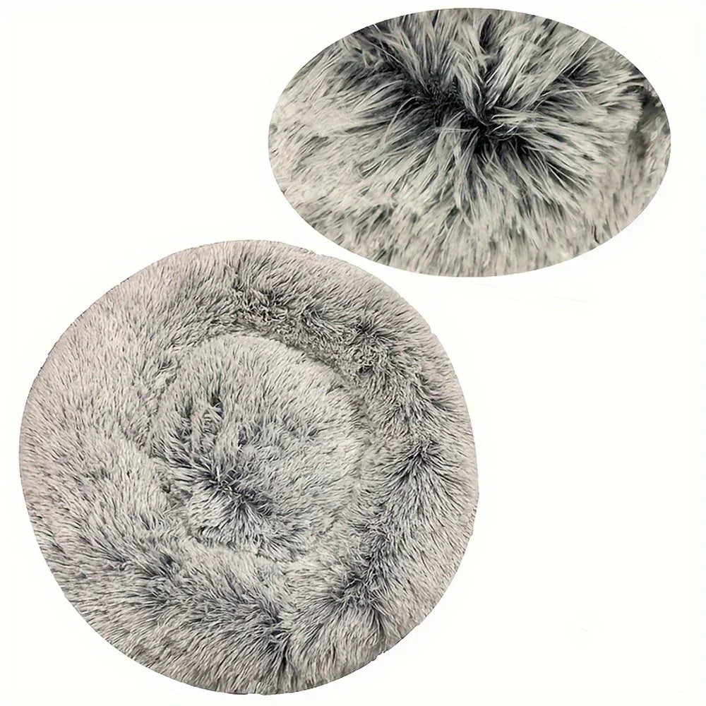 Round fluffy gray pet bed with soft faux fur, ideal for dogs and cats, shown in close-up.