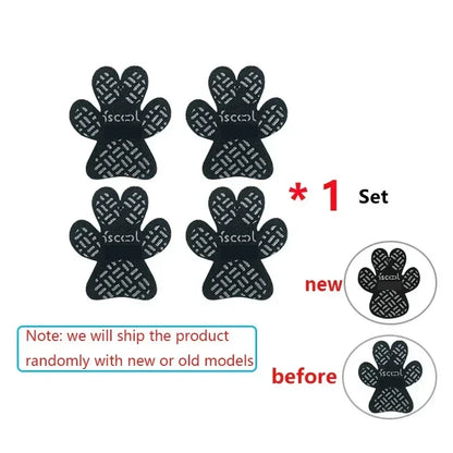 Set of four black paw-shaped pet traction pads with non-slip surface, new and old models shown.