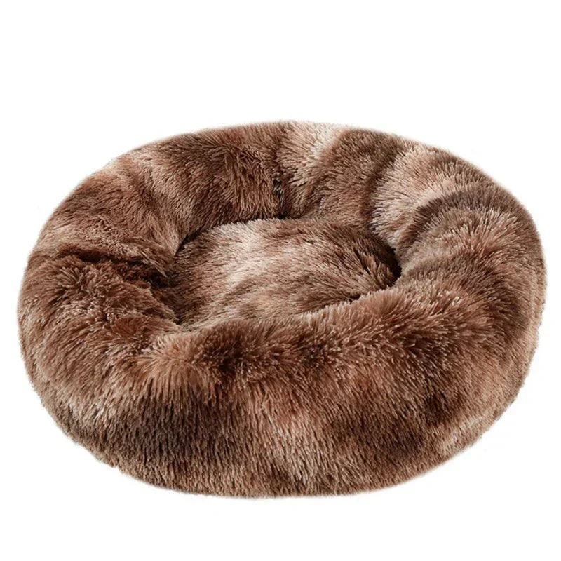 Round plush brown pet bed with soft faux fur, perfect for dogs or cats.