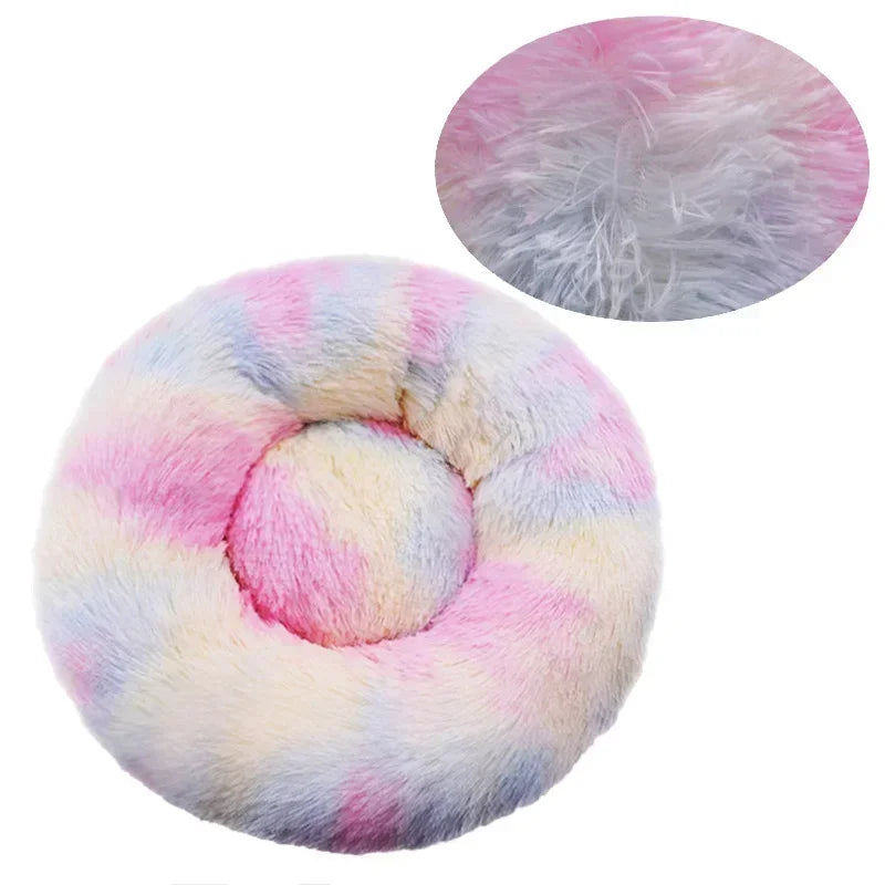 Round pastel fluffy pet bed with soft faux fur texture, ideal for cats and small dogs.