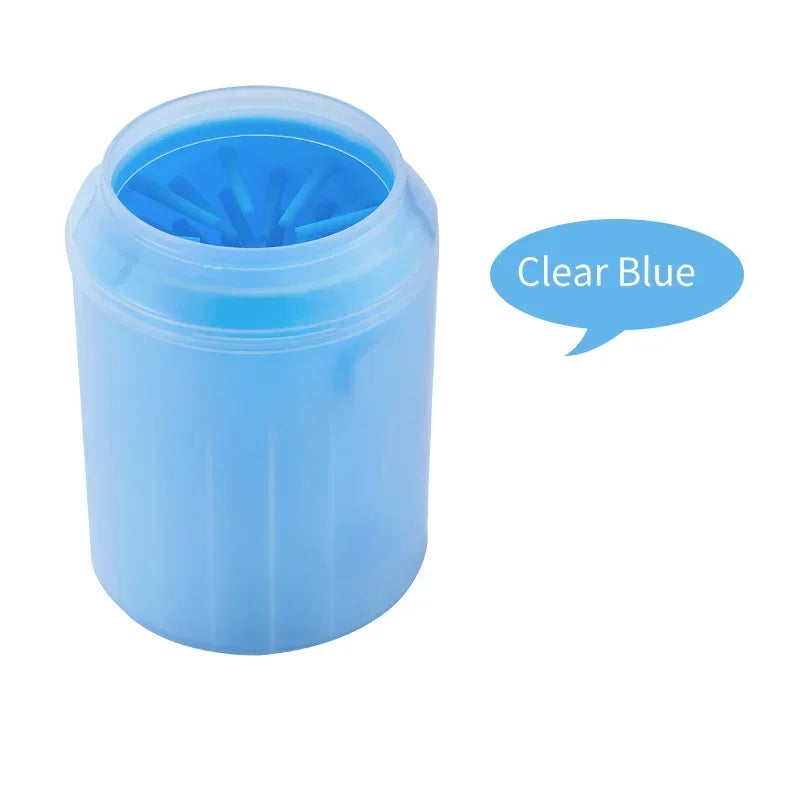Clear blue silicone dog paw cleaner cup for pet grooming, with soft bristles inside.