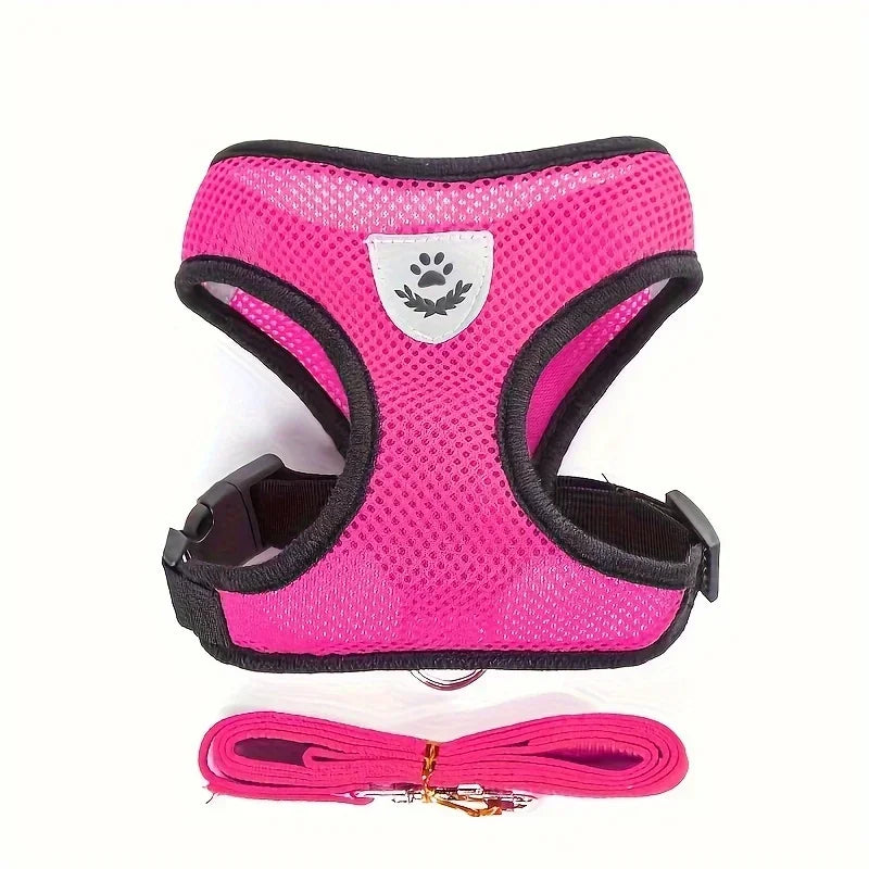 Pink mesh adjustable dog harness with paw print emblem and matching leash set