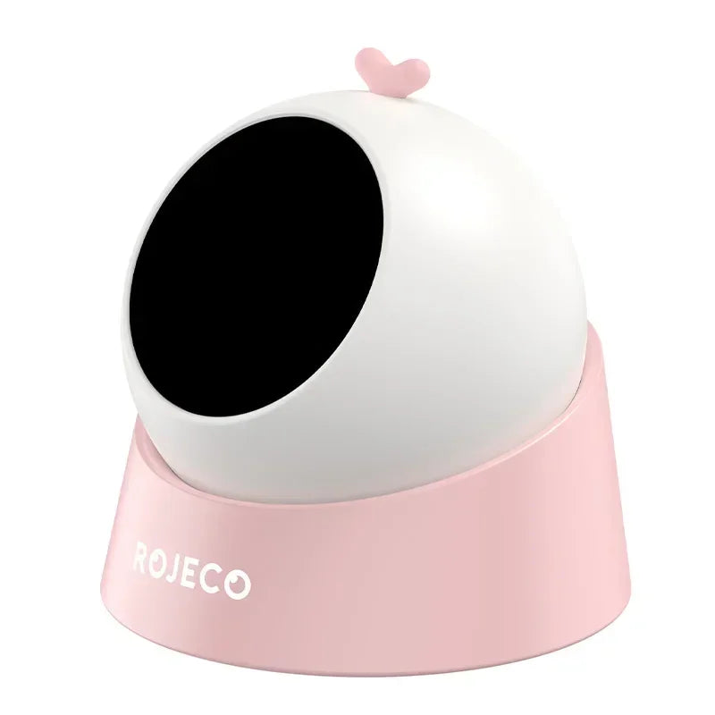Modern pink and white dome-shaped cat litter box with heart accent and ROJECO logo